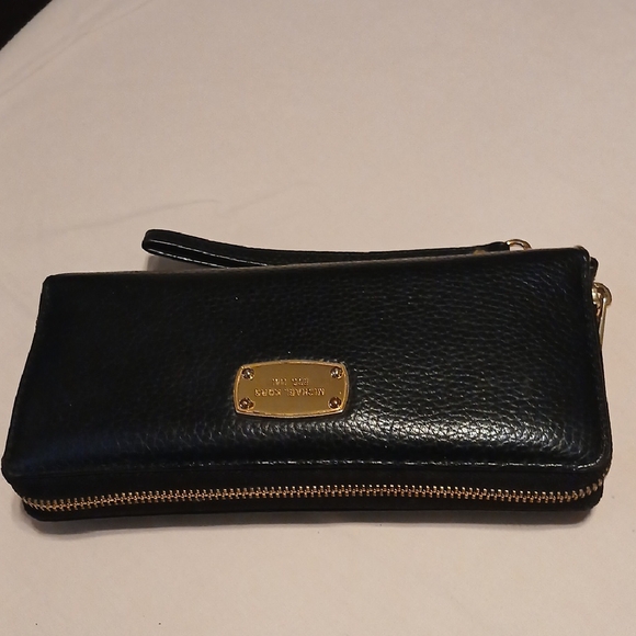 Michael Kors Handbags - Michael Kors Black Wristlet with Gold Accents NWOT